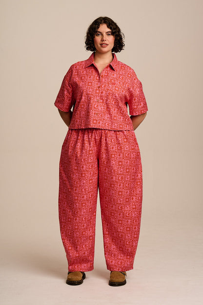 Freddie - Barrel Leg Cotton Trousers in Pink & Red Lunar Checkerboard