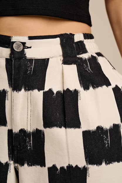 Ashby - Cotton Barrel Leg Trousers in Black & Ecru Blurred Checkerboard