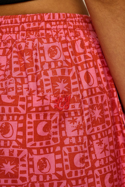 Freddie - Barrel Leg Cotton Trousers in Pink & Red Lunar Checkerboard
